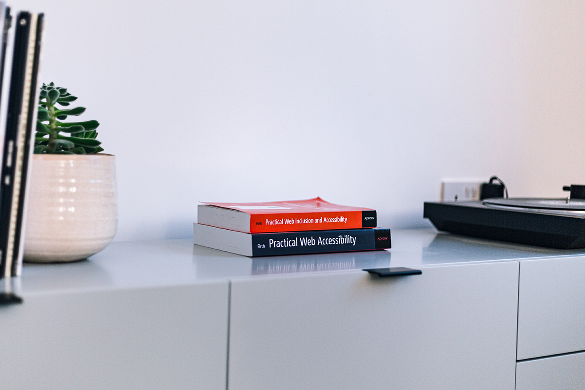 A close-up shot of two books on my media unit - the two books I wrote on accessibility