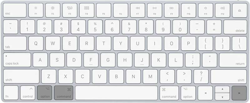 A keyboard showing the Shift + Option + Arrow Shortcut